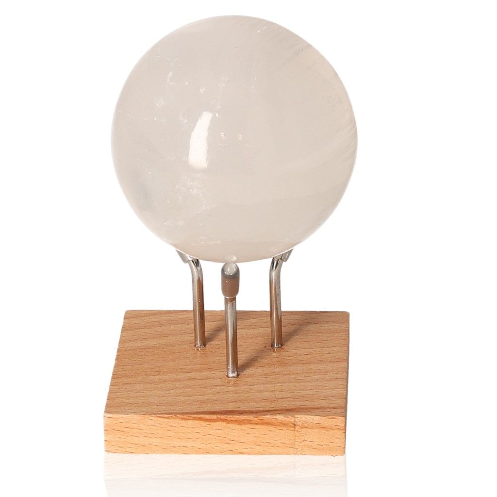 Selenite sphere 6cm on wooden stand by Sylvia Crystals for mindfulness and spiritual growth