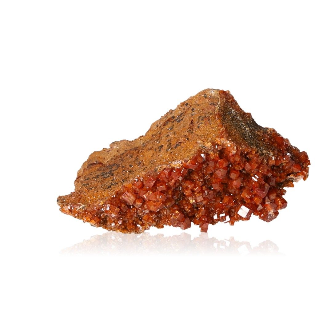 Vanadinite Druze with vibrant reddish-orange hexagonal crystals and a glassy surface, enhancing focus and motivation.