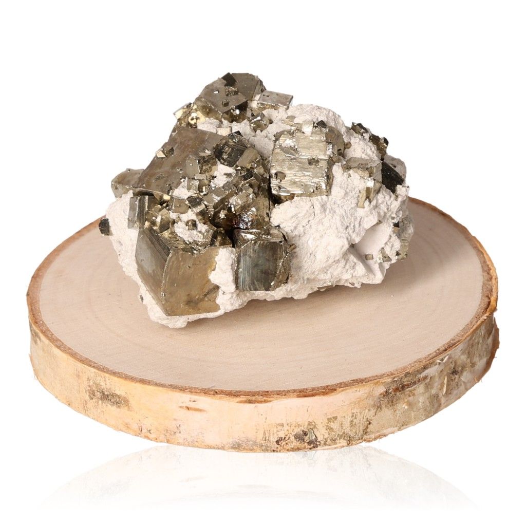 Pyrite druze crystal on a wooden base, symbolizing courage and motivation for personal and professional growth.