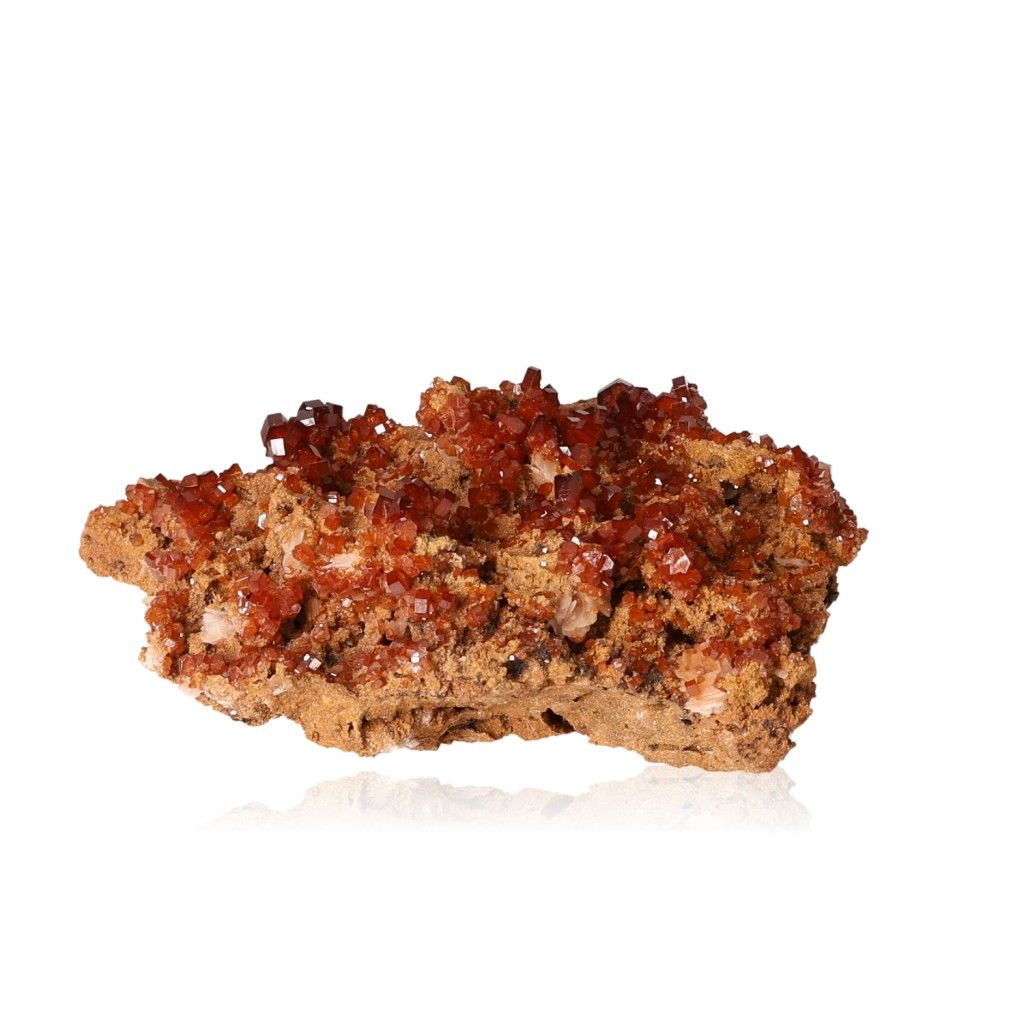 Vanadinite Druze with vibrant reddish-brown hexagonal crystals on a glassy surface, enhancing focus and motivation.