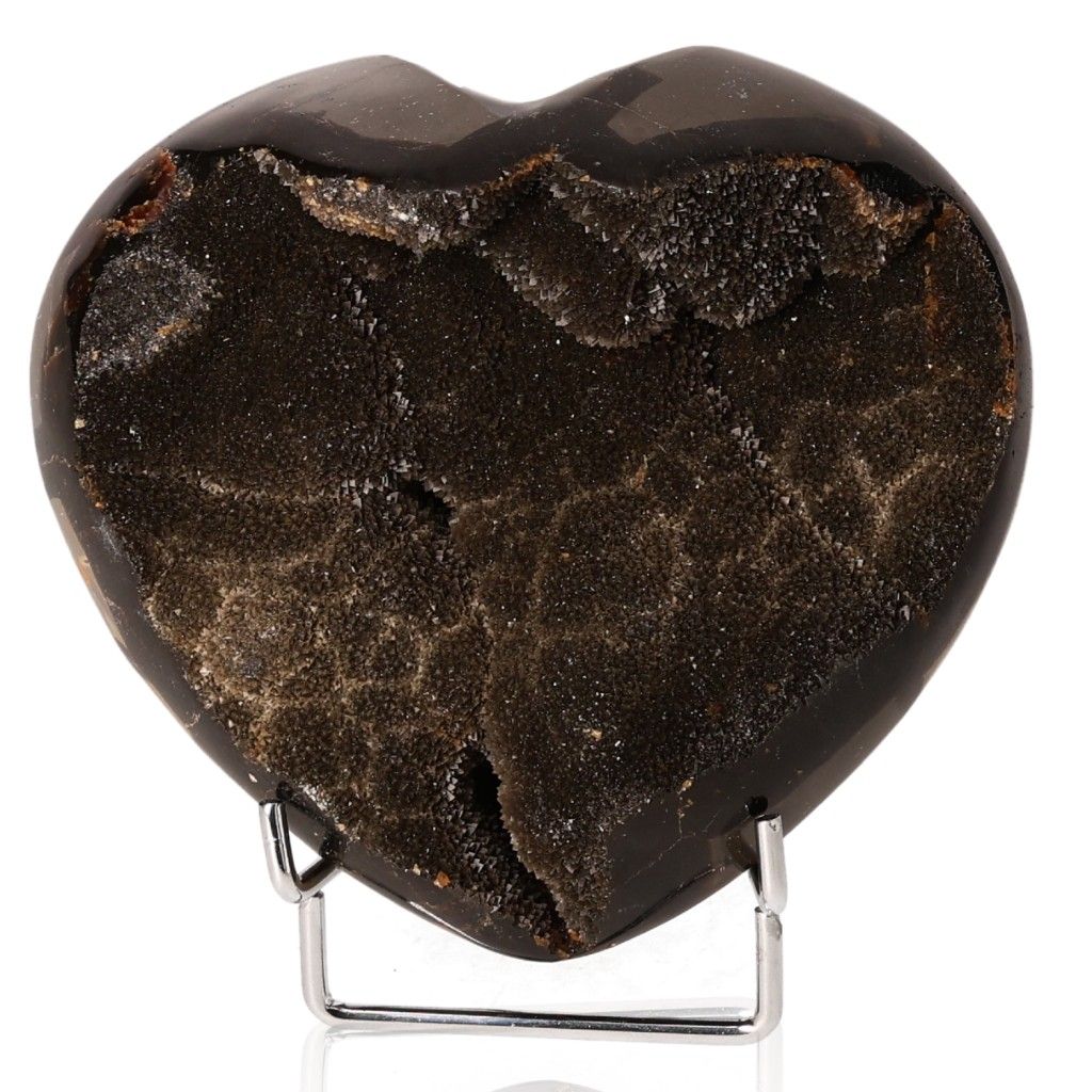 Heart-shaped Septarian "Dragon Stone" showcasing unique mineral patterns on a display stand.