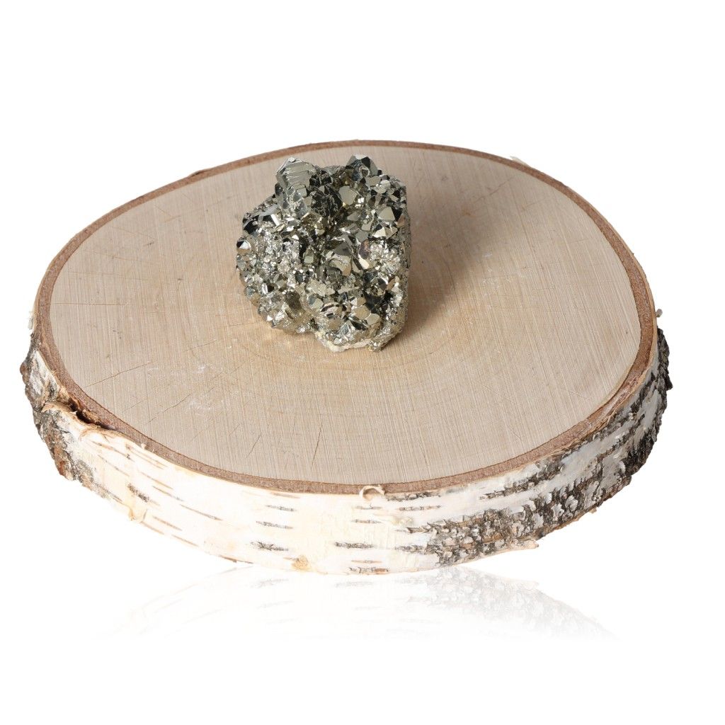 Pyrite druze on wooden slab, symbolizing mental and material independence, courage, and inspiration for new ideas.