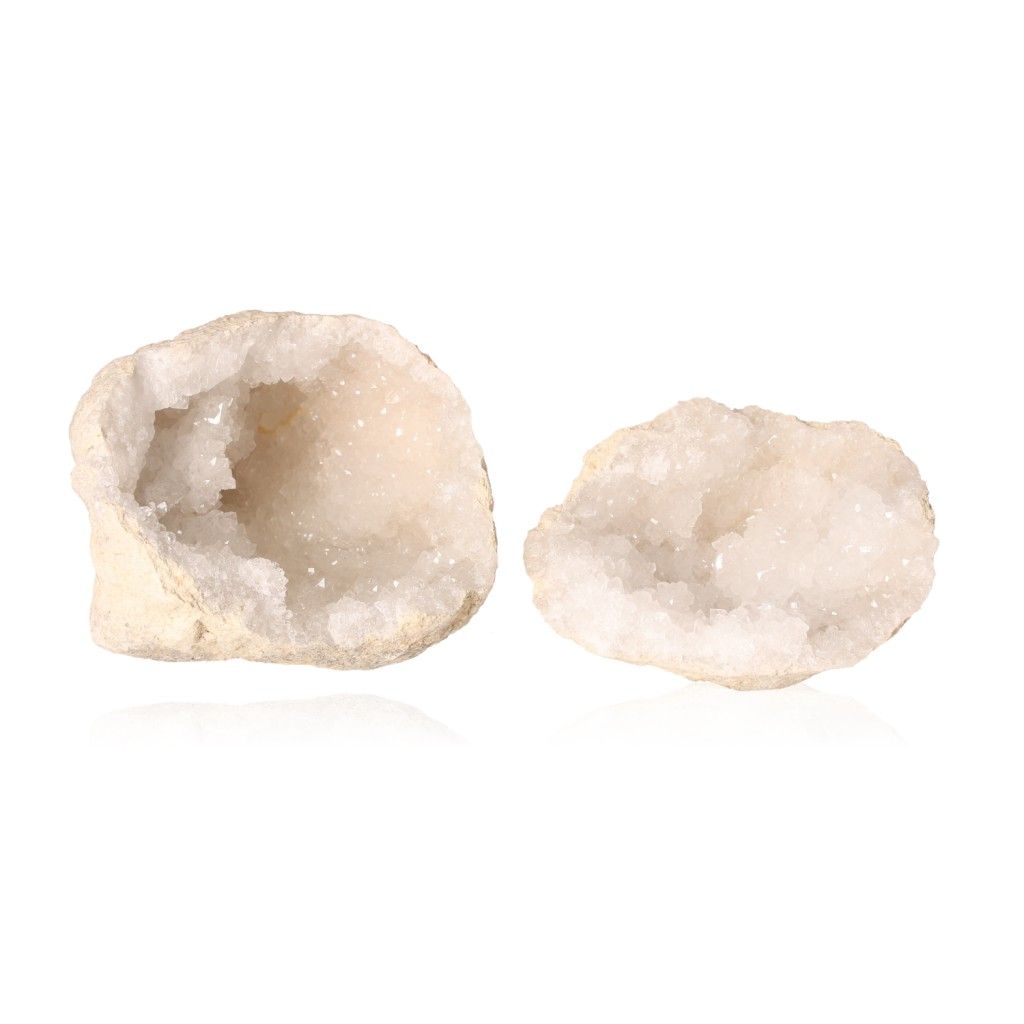 Milky quartz geode with sparkling white crystals, promoting tranquility and balance, perfect for enhancing focus and positive energy.