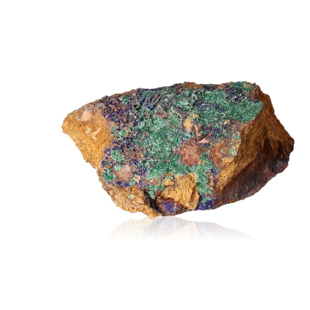 Raw malachite druze stone with vibrant green and brown hues, known for its soothing and energizing properties.