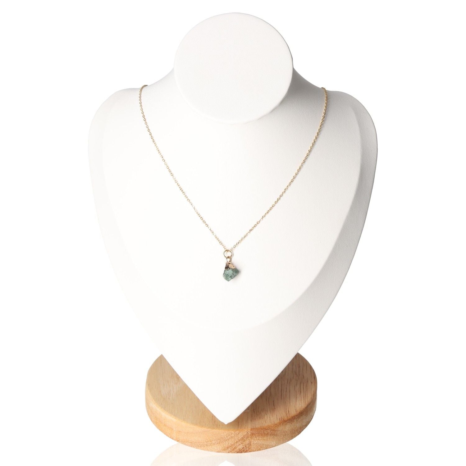 Elegant crystal necklace displayed on a white jewelry stand, part of the Good Fortune set for positivity and abundance.