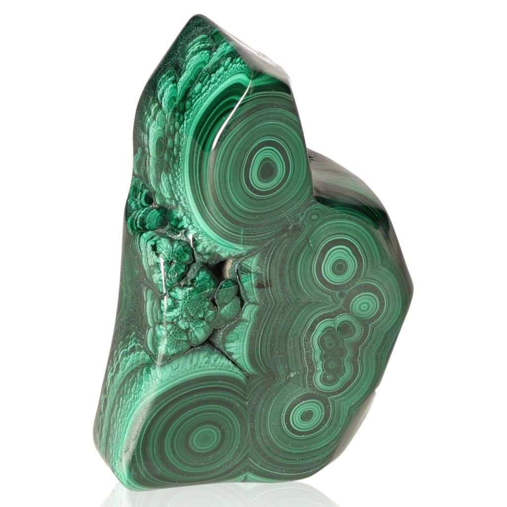 Polished malachite stone with vibrant green swirling patterns, known for its soothing energy and ability to inspire courage and hope.