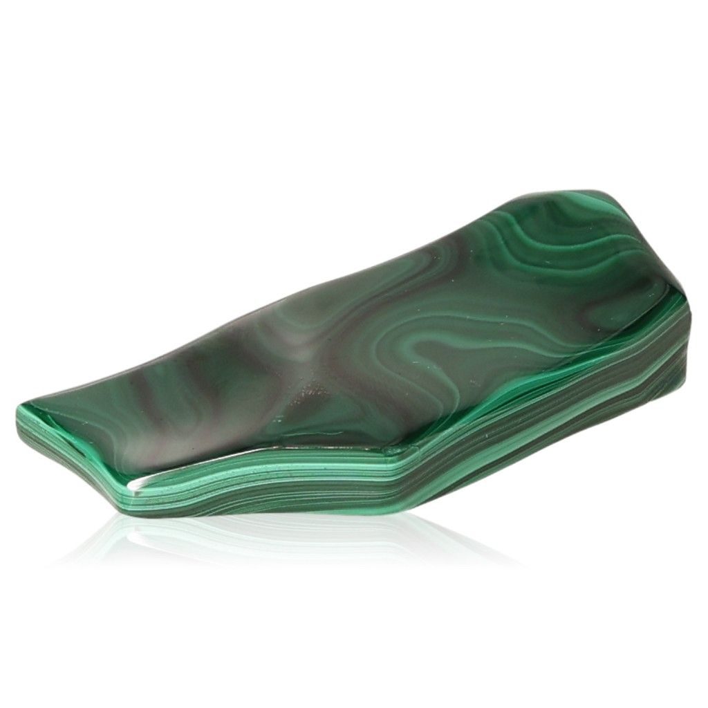 Smooth polished malachite stone emanating soothing energy for courage, hope, and inner harmony in life changes.