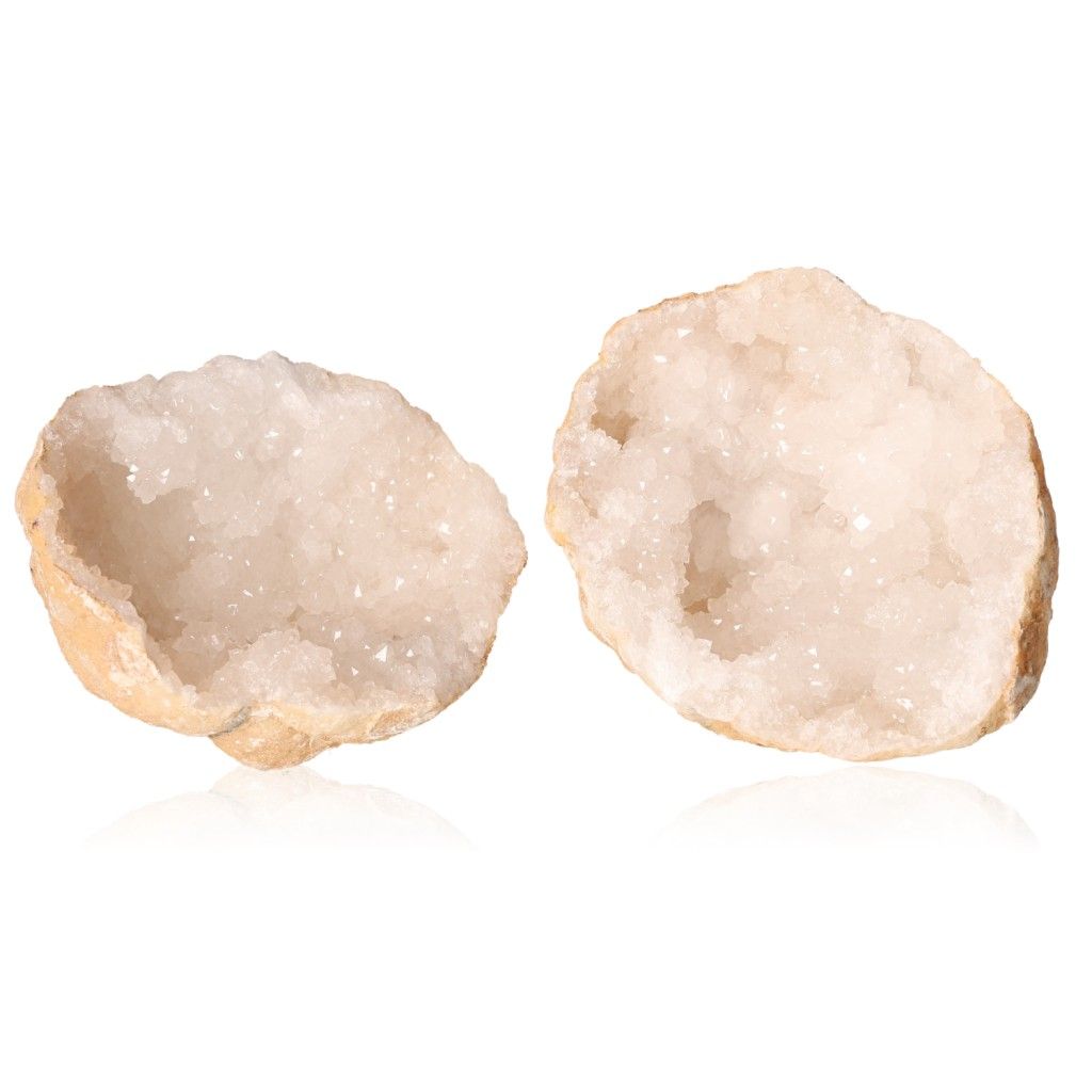 Milky quartz geode, rugged exterior with sparkling white crystals, enhances energy balance and promotes tranquility.