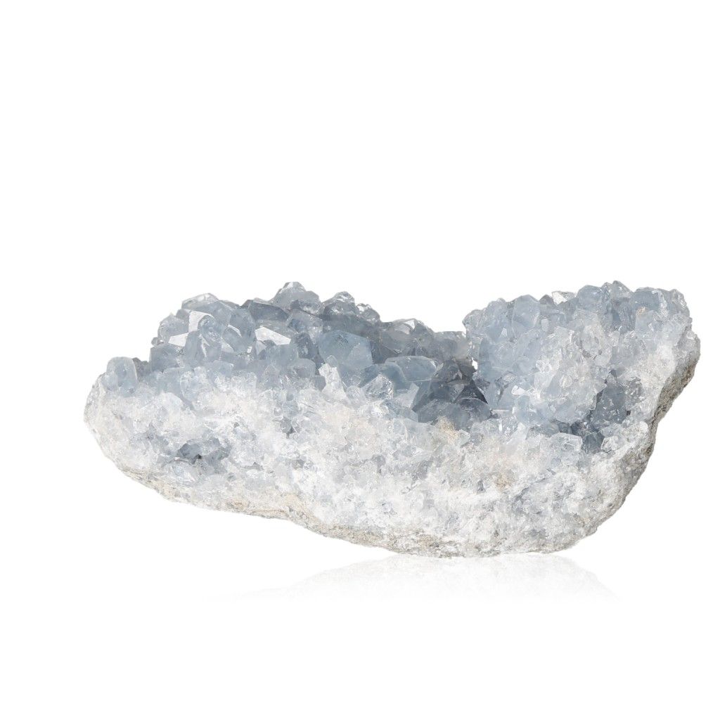 Celestite crystal cluster with calming blue hues promoting serenity and spiritual connection.