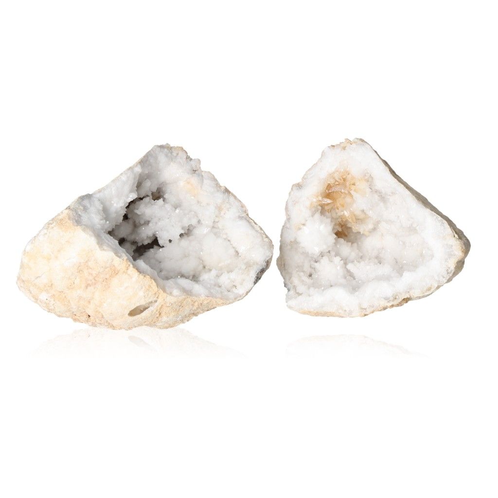 Milky quartz geode with rugged shell revealing sparkling, cloudy white crystals, known for purifying energy and enhancing tranquility.