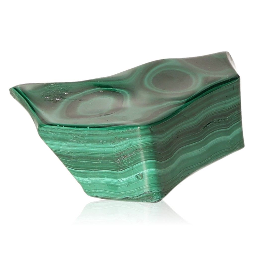 Polished green malachite stone, known for soothing energies and promoting courage and optimism.