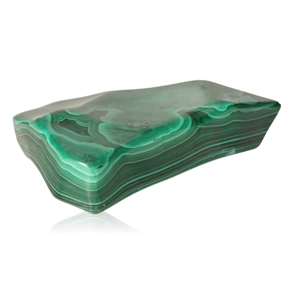 Polished malachite stone with swirling green patterns, known for soothing energy and promoting courage and positivity.