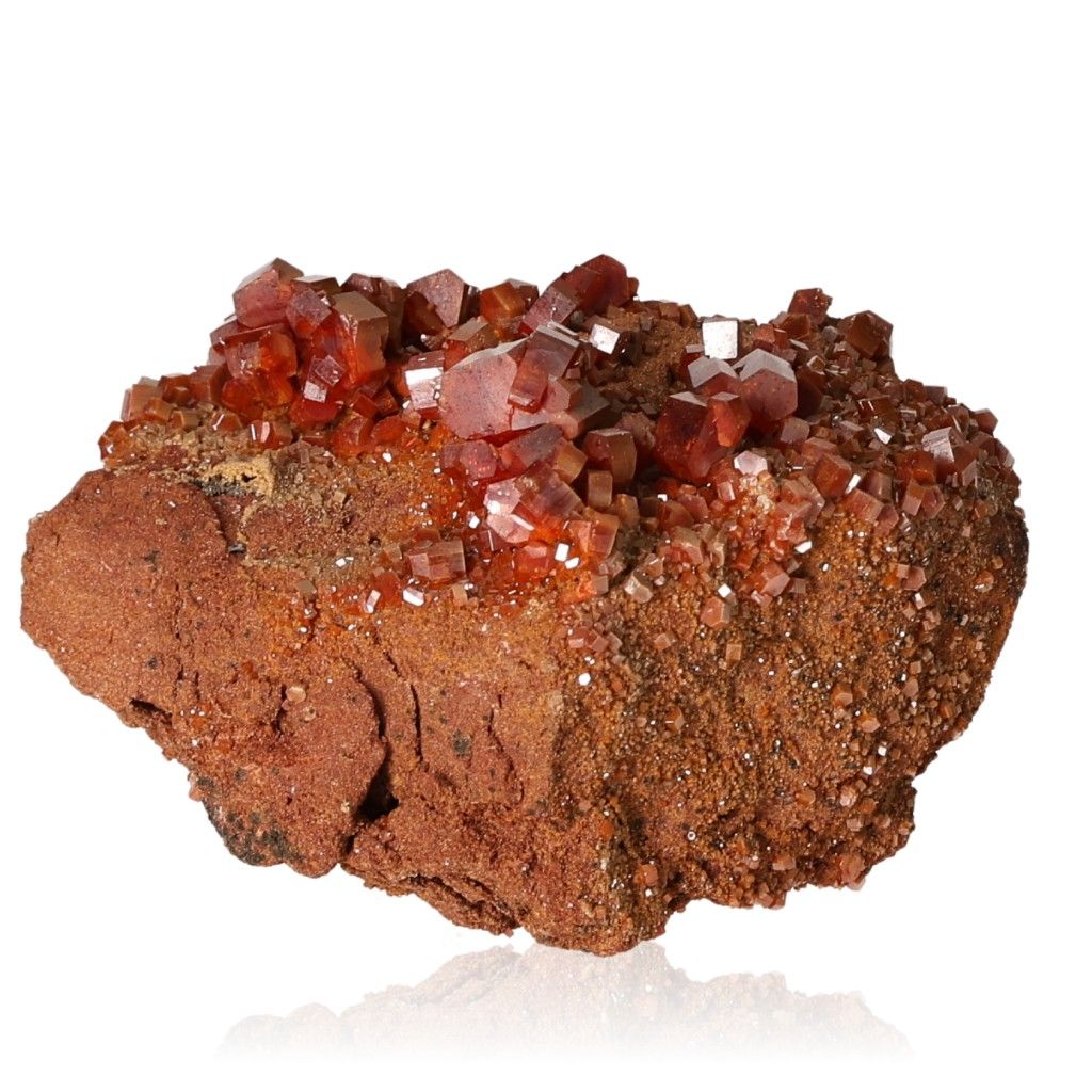 Vanadinite Druze with reddish-brown hexagonal crystals and glassy surface, enhances focus and motivation, visually captivating stone.