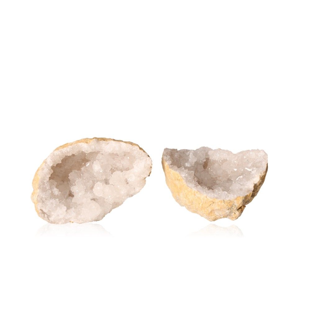 Milky quartz geode split open, revealing sparkling, cloudy white crystals, perfect for enhancing tranquility and balancing energy.