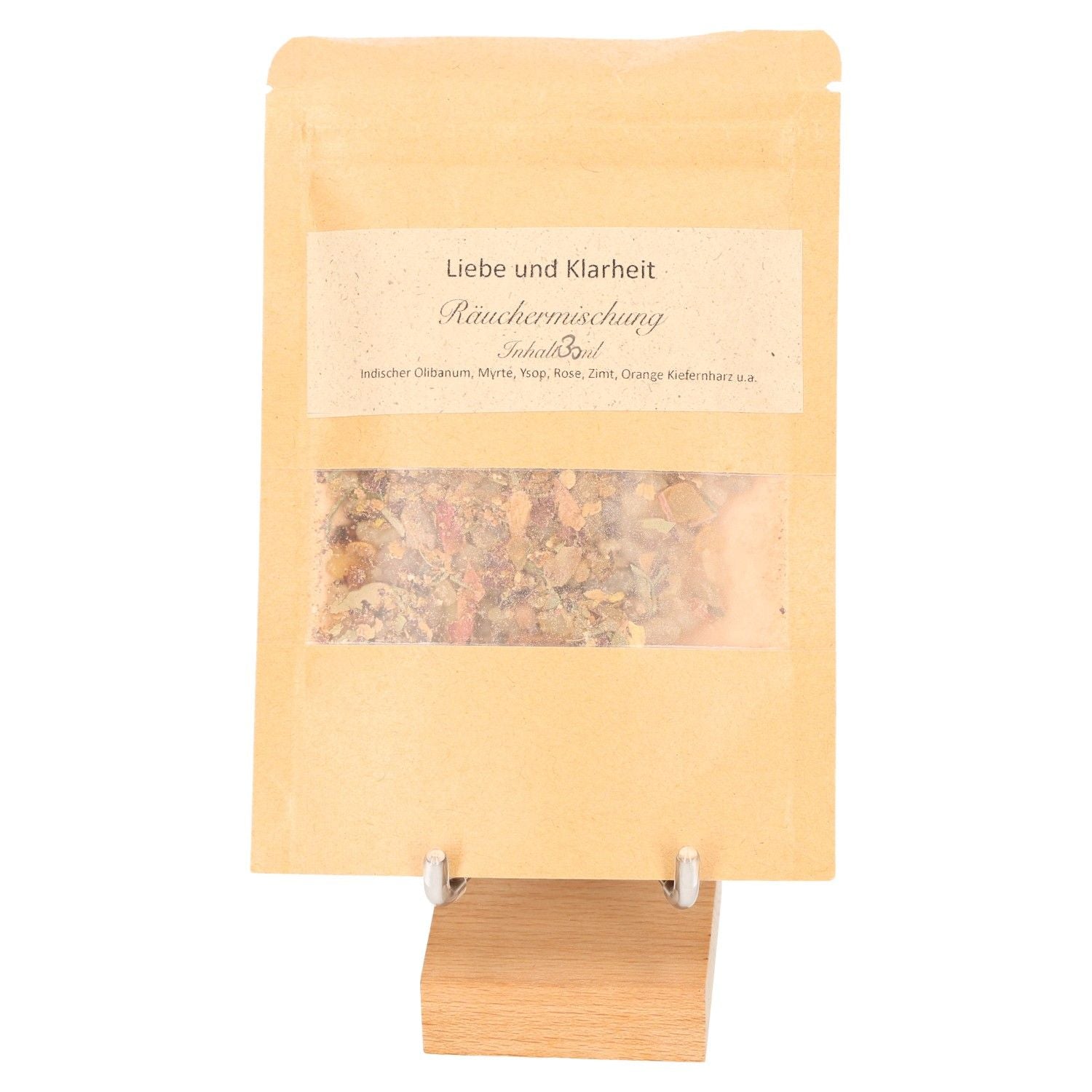 Love and Clarity incense blend featuring myrtle, displayed in eco-friendly packaging on a wooden stand.