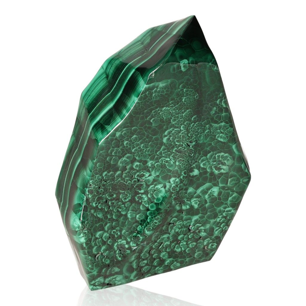 Malachite gemstone with vibrant green hues, symbolizing nature's soothing energy and promoting courage and positive transformation.