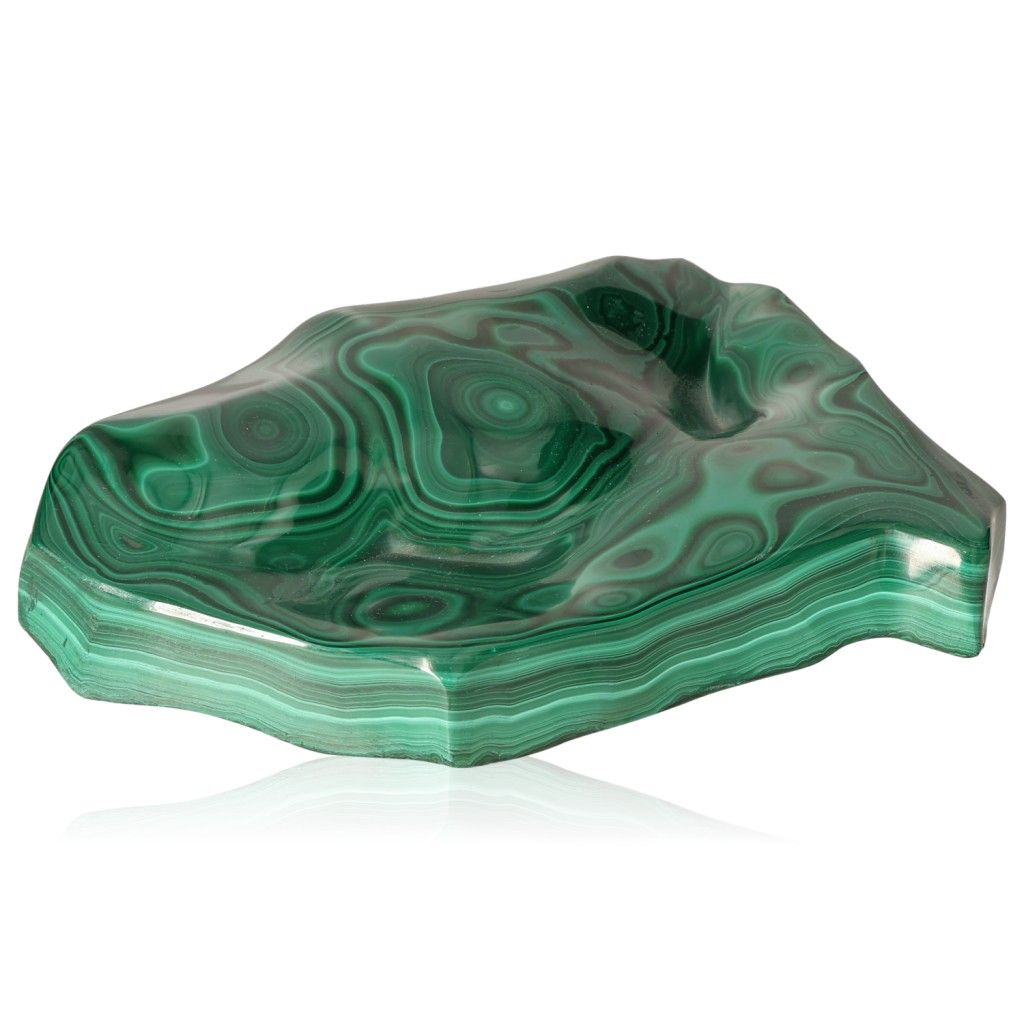 Polished green malachite stone with unique swirling patterns, known for its soothing energy and ability to inspire courage and hope.