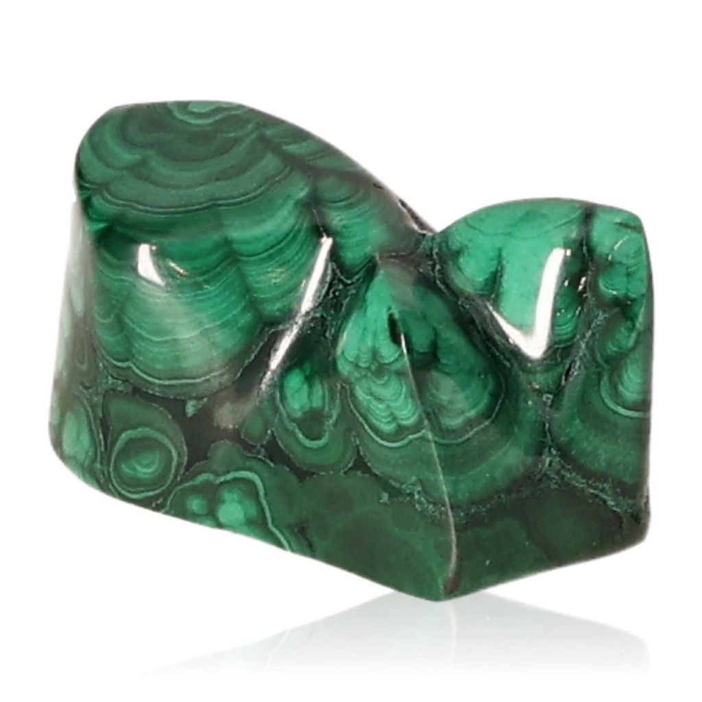 Polished malachite stone with vibrant green swirling patterns, symbolizing nature's soothing and energizing properties.