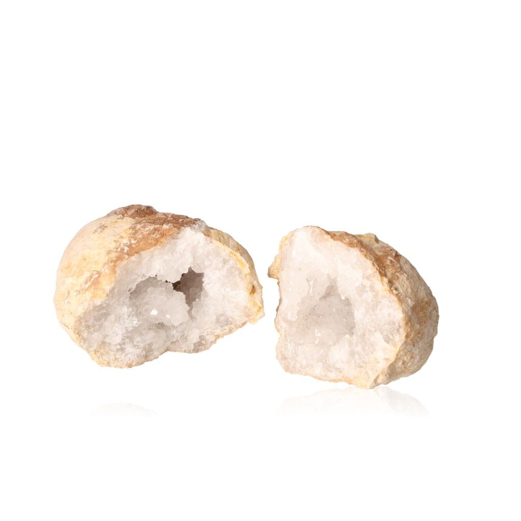 Milky quartz geode with sparkling white crystals enhancing tranquility and balance, perfect for amplifying energy and focus.