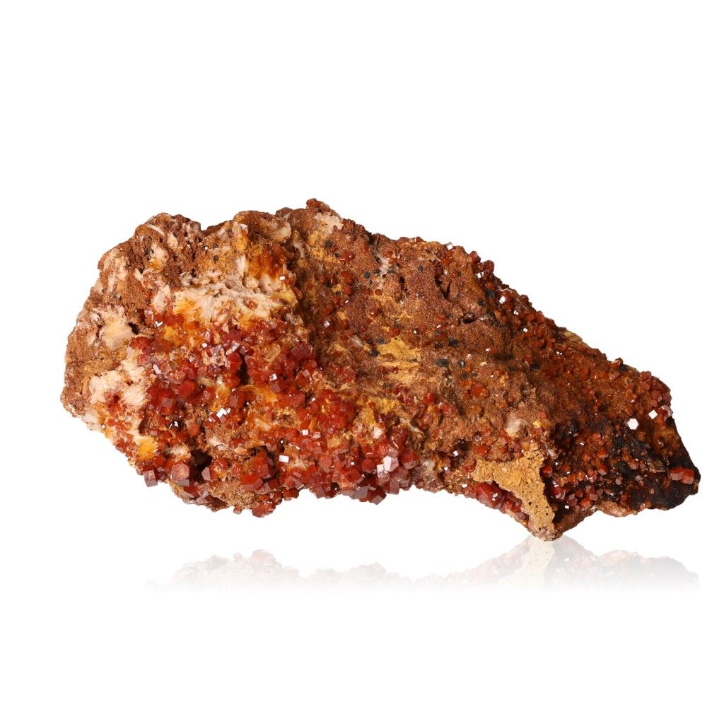 Vanadinite Druze with vibrant reddish-brown hexagonal crystals enhancing focus and motivation, visually captivating with bold colors.