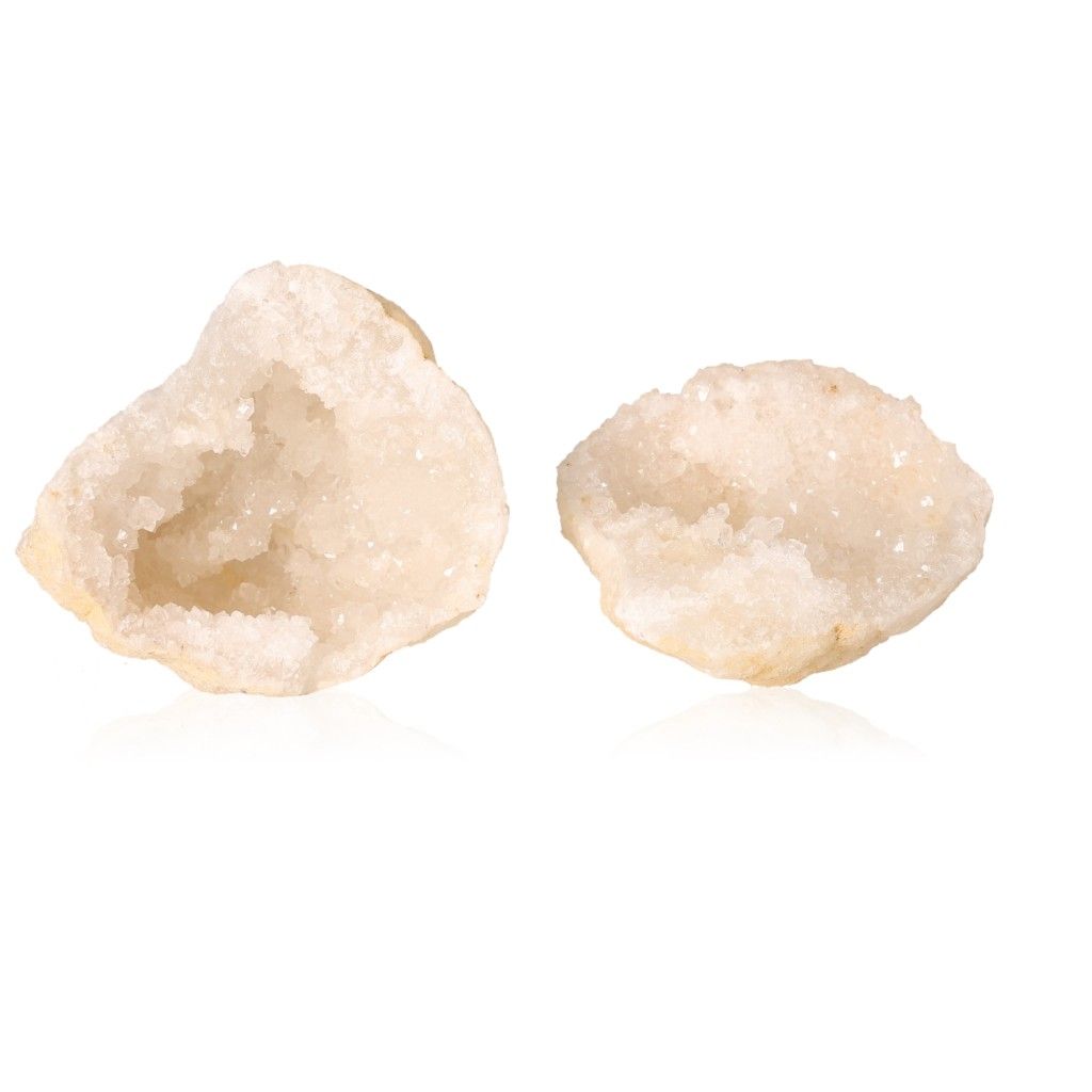 Milky quartz geode pair with sparkling cloudy white crystals, showcasing a rugged earthy shell, known for purifying and balancing energy.