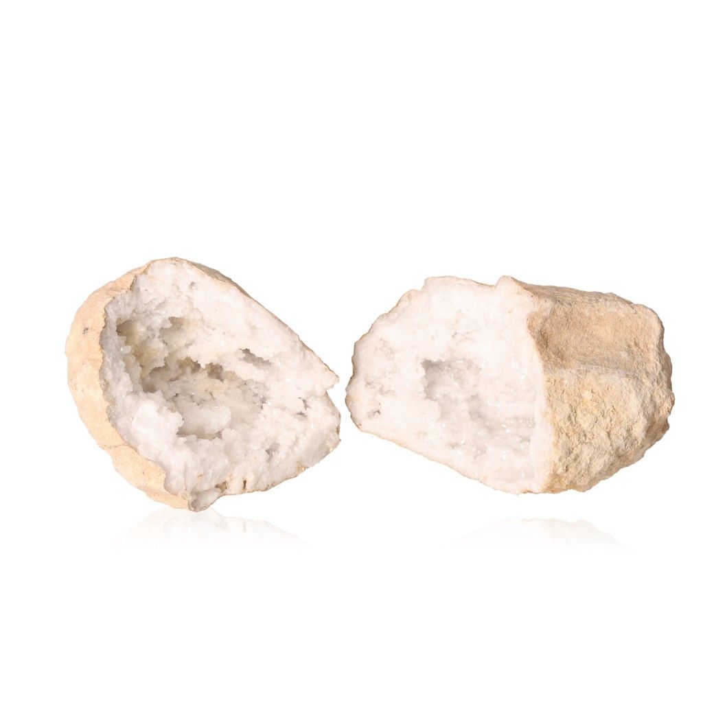 Milky quartz geode split open showing sparkling, cloudy white crystals, known for purifying energy and enhancing focus.