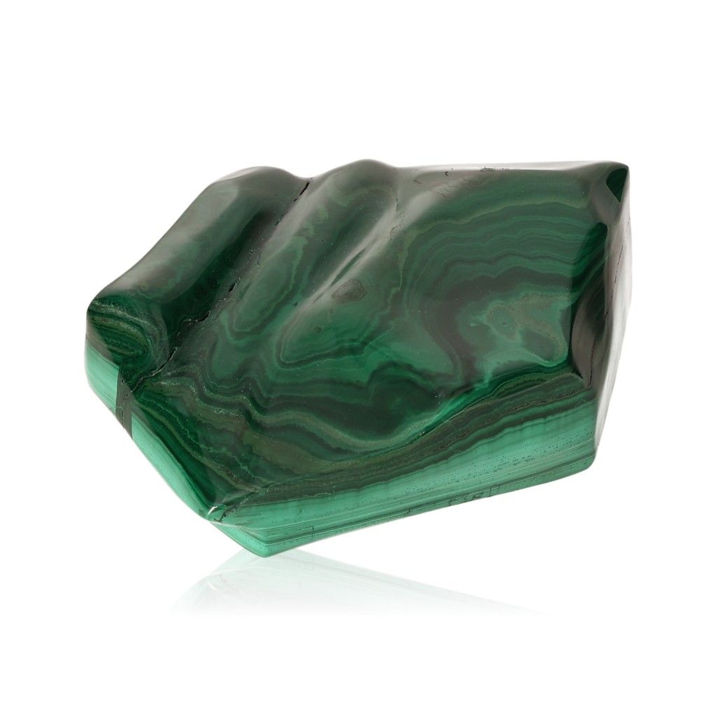 Polished malachite stone with rich green hues, known for its soothing energy and ability to inspire courage and positive change.