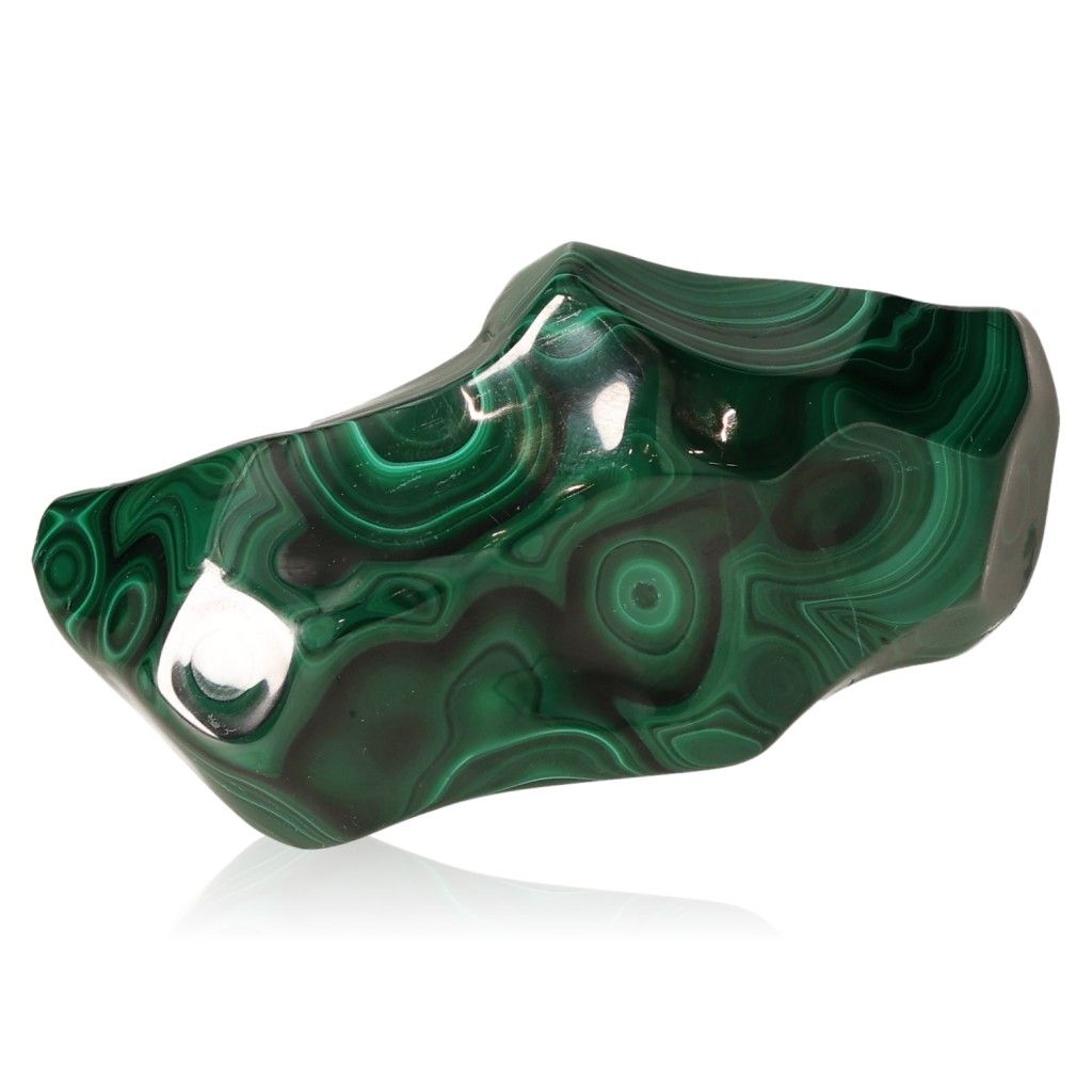 Polished malachite stone with vibrant green swirls, symbolizing nature's soothing energy and promoting inner harmony and optimism.