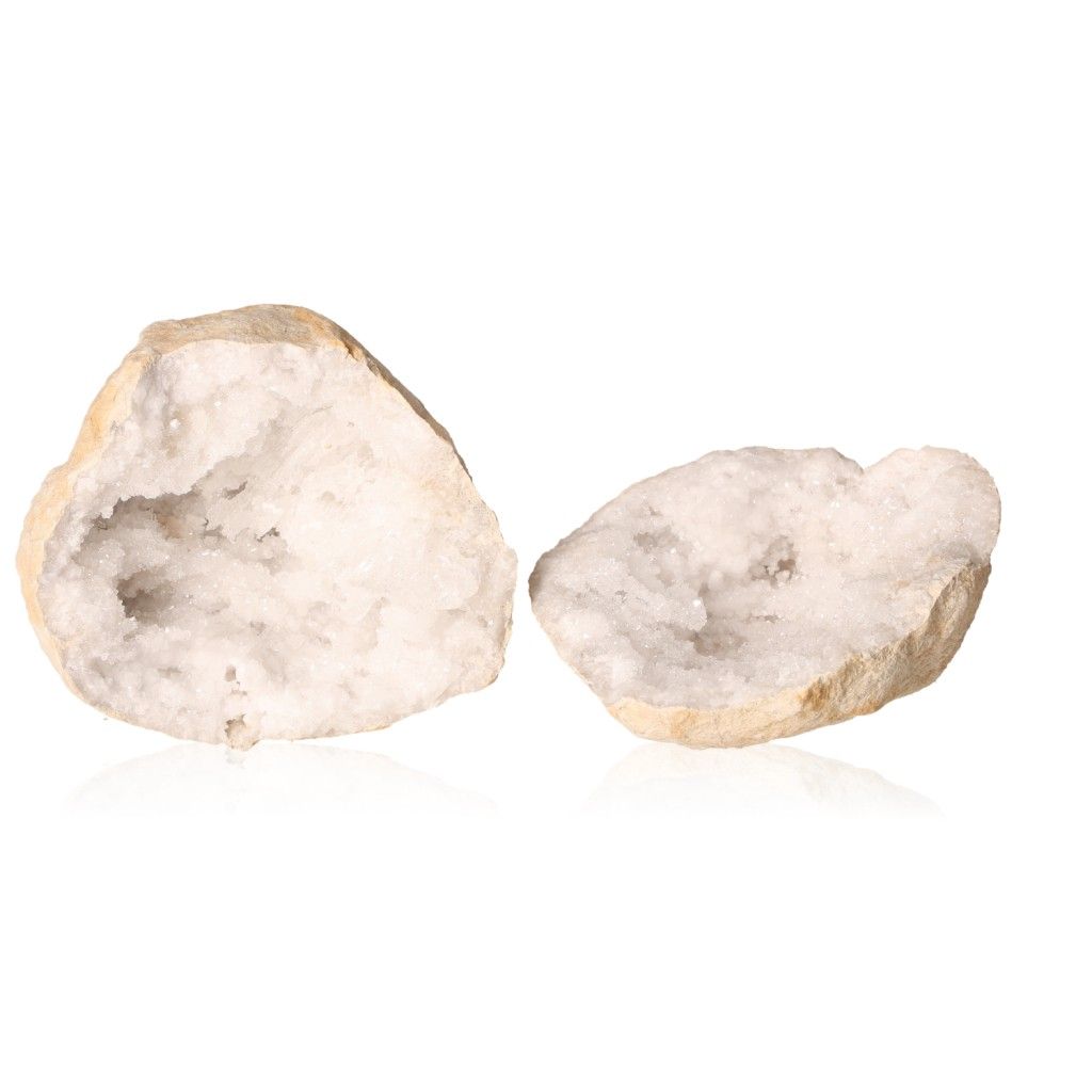 Milky quartz geode split open showcasing sparkling white crystals, known for amplifying energy and promoting tranquility and clarity.