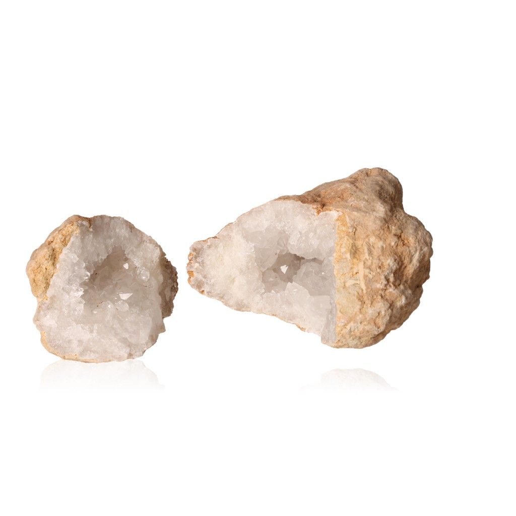 Opened quartz geode displaying sparkling white crystals, ideal for enhancing tranquility and clarity in any space.