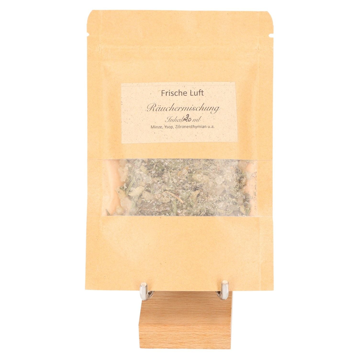 Package of "Fresh Air" incense blend on a stand showcasing its refreshing herbs and plants for a calming experience.