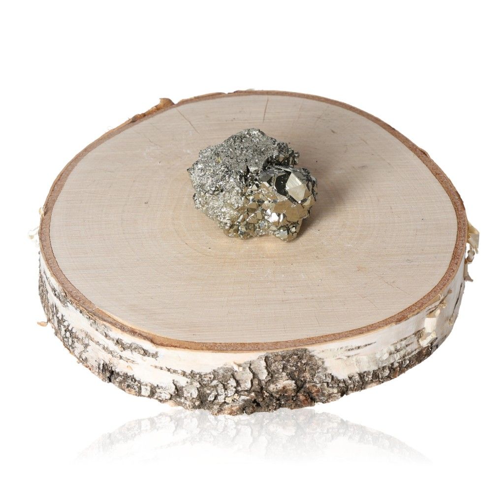 Pyrite druzy on wooden slice, promotes independence and courage, ideal for creativity and goal achievement.