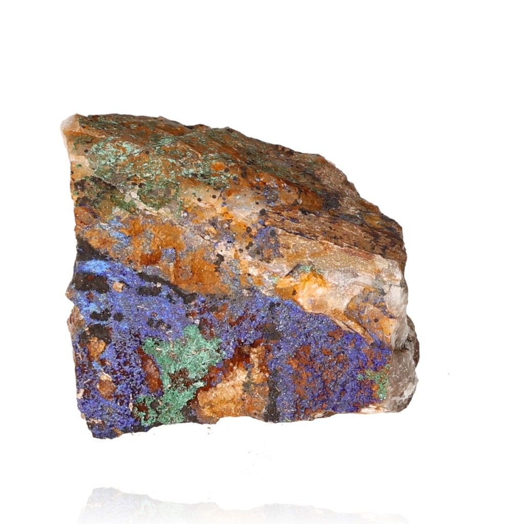 Raw malachite stone with vibrant green and blue patterns on a white background, showcasing its natural beauty and unique texture.