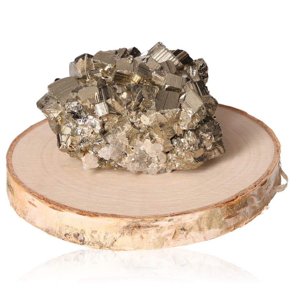 Pyrite druzes with calcite on wooden display, enhancing mental independence and inspiring courage for new ideas and goal achievement.