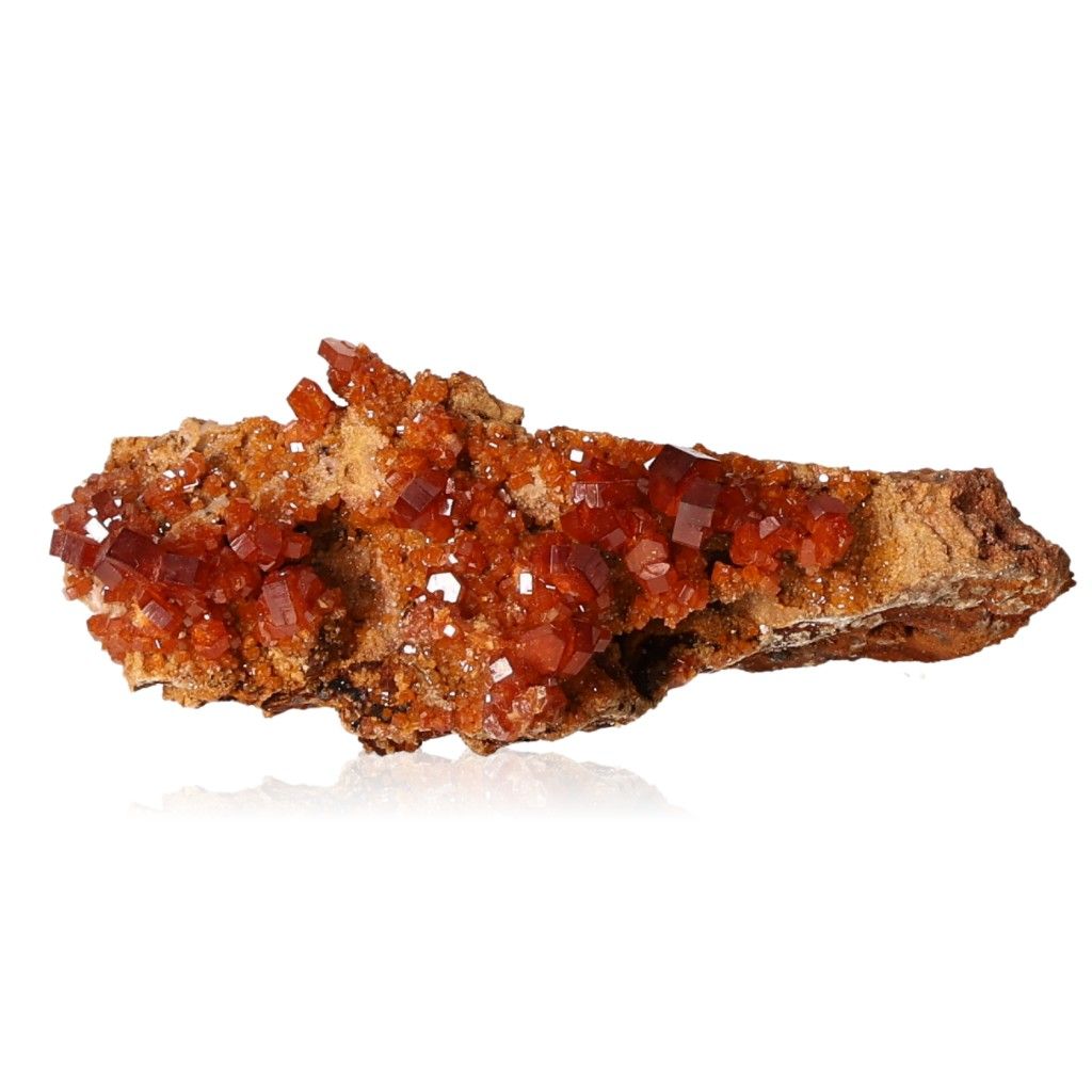 Vanadinite Druze with vibrant reddish-brown hexagonal crystals, enhancing focus and motivation through its striking geometric patterns.