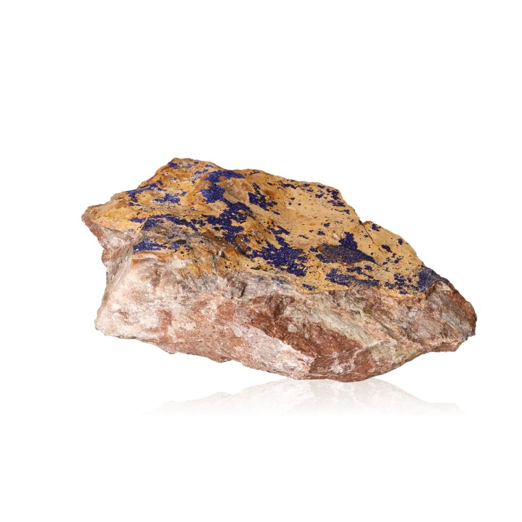 Azurite mineral rock with deep blue patterns on a rough copper-rich surface, ideal for collectors and spiritual insight seekers.