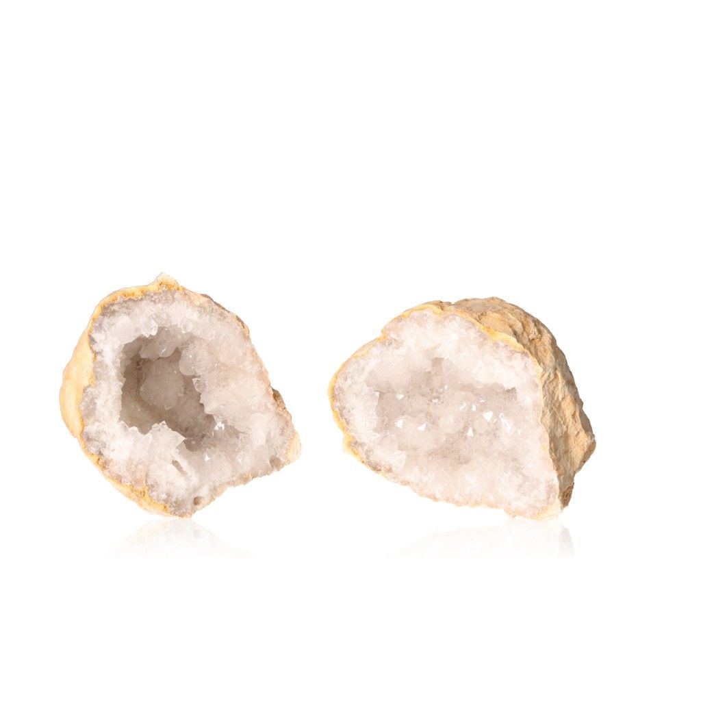 Sparkling milky quartz geode with rugged outer shell showcasing cloudy white crystals, ideal for boosting focus and positive energy.