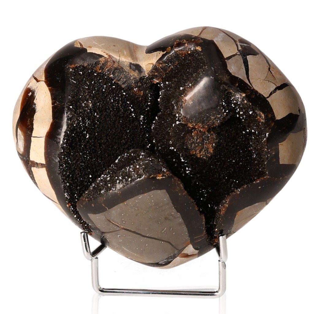 Heart-shaped septarian stone with unique patterns, known as the "Dragon Stone," symbolizing power and endurance.