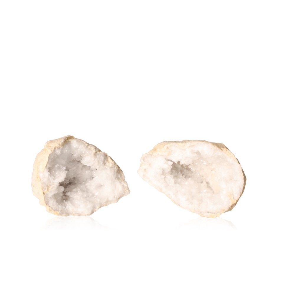 Milky quartz geode with sparkling white crystals and rugged shell, ideal for energy balance and tranquility.