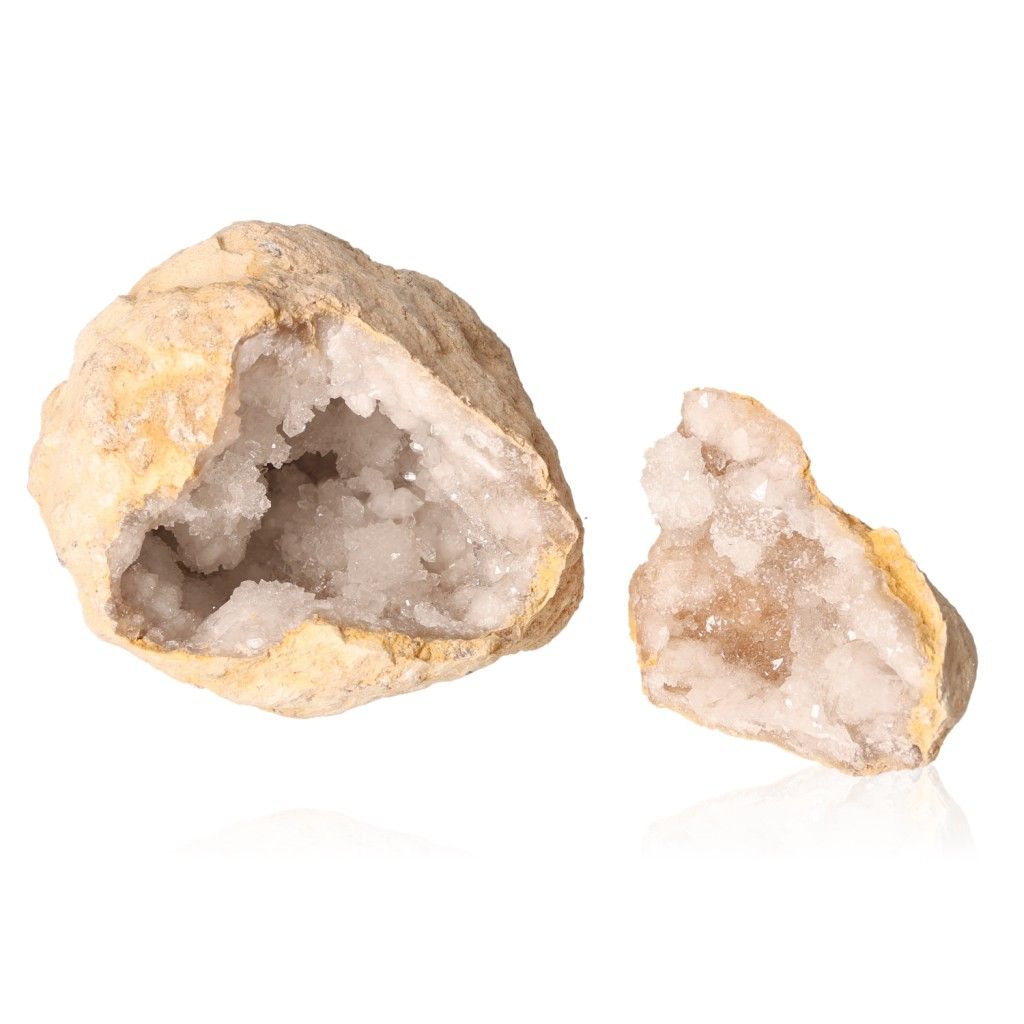 Milky quartz geode with earthy outer shell showing sparkling white crystals, perfect for purifying energy and enhancing tranquility.