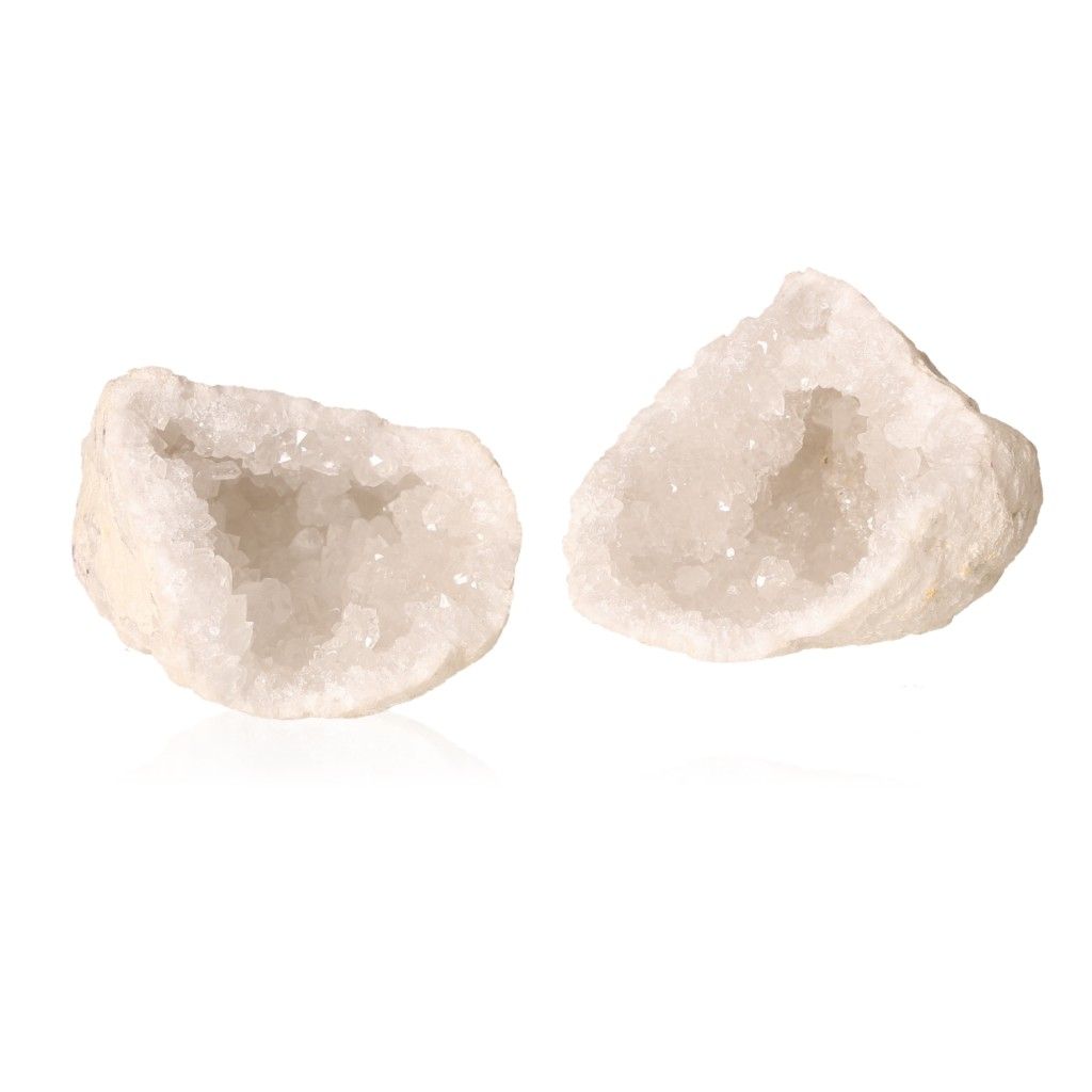 Sparkling milky quartz geode halves showcasing crystal interior for energy balance and tranquility.