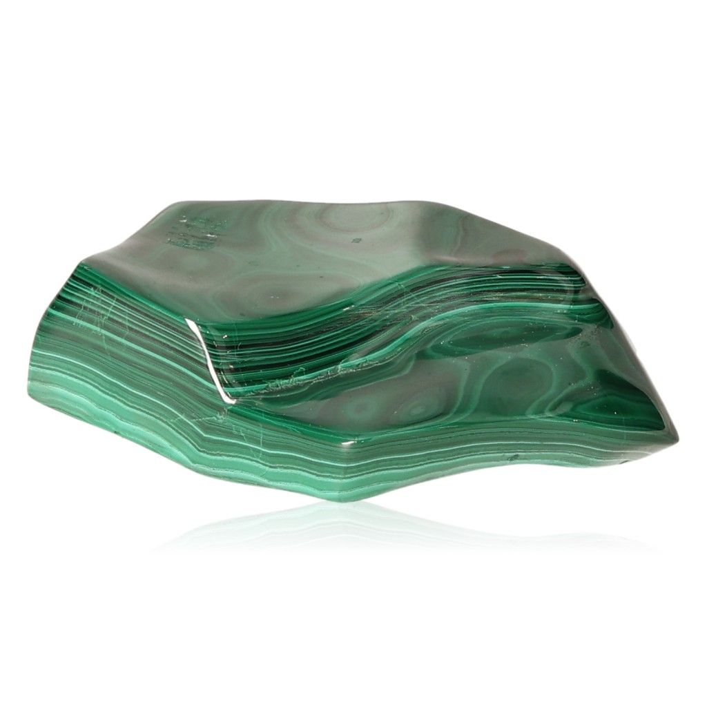 Polished green malachite stone displaying natural banded patterns, known for its soothing energy and ability to promote inner harmony.