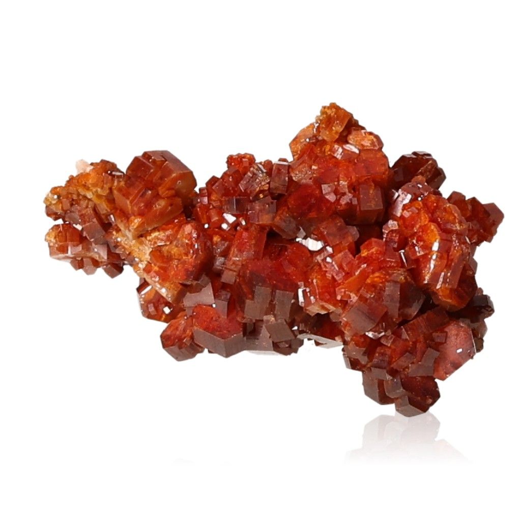 Vanadinite Druze with reddish-brown hexagonal crystals and a glassy surface, enhancing focus and determination.