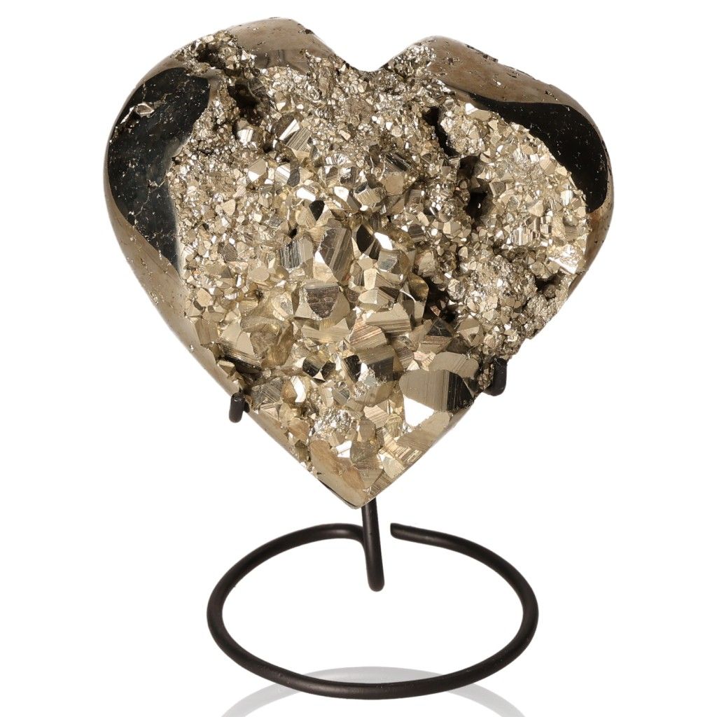 Heart-shaped pyrite stone on a stand, promoting independence and courage, ideal for fostering new ideas and achieving goals.