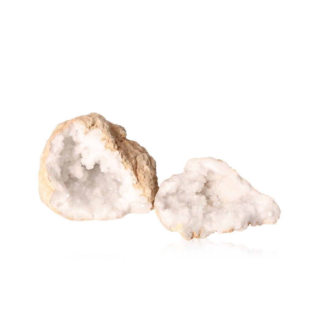 Milky quartz geode with rugged outer shell and sparkling white crystals, enhancing tranquility and positive energy.