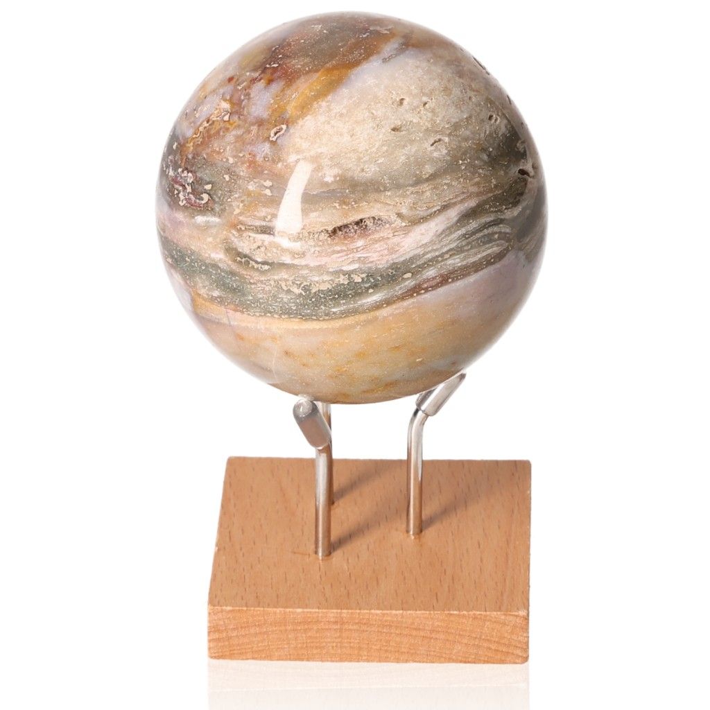 Ocean Jasper Sphere with unique patterns, promoting joy and tranquility, displayed on a wooden stand for emotional balance and positivity.