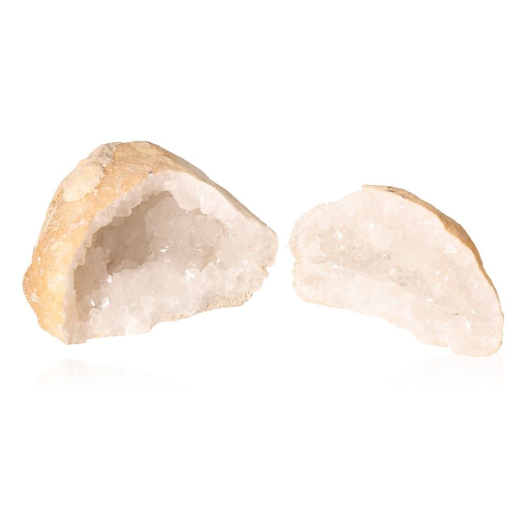 Milky quartz geode with rugged shell and sparkling white crystals, enhancing tranquility and energy balance for focus and positive vibes.