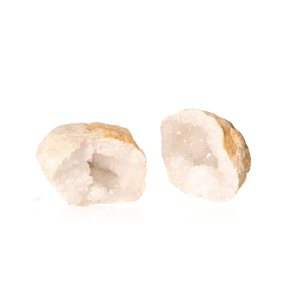 Milky quartz geode split open to show sparkling white crystals, ideal for purifying energy and promoting tranquility and clarity.