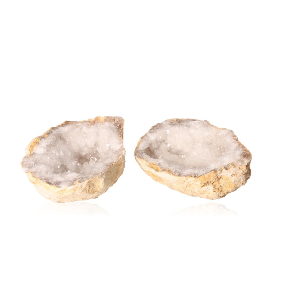 Milky quartz geode split open showing sparkling, cloudy white crystals with a rugged outer shell, ideal for energy cleansing and focus.