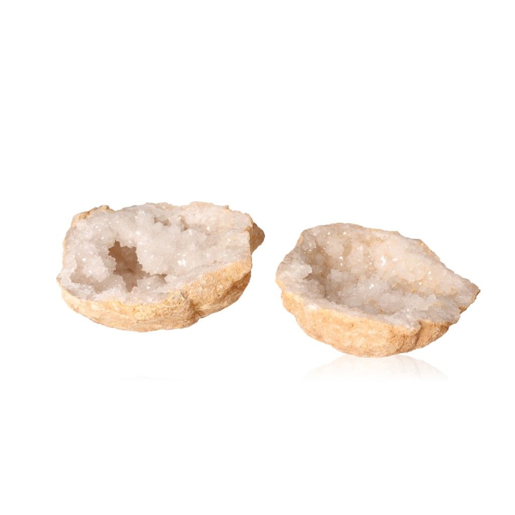 Milky quartz geode split open showing sparkling white crystals for energy balance and clarity enhancement.